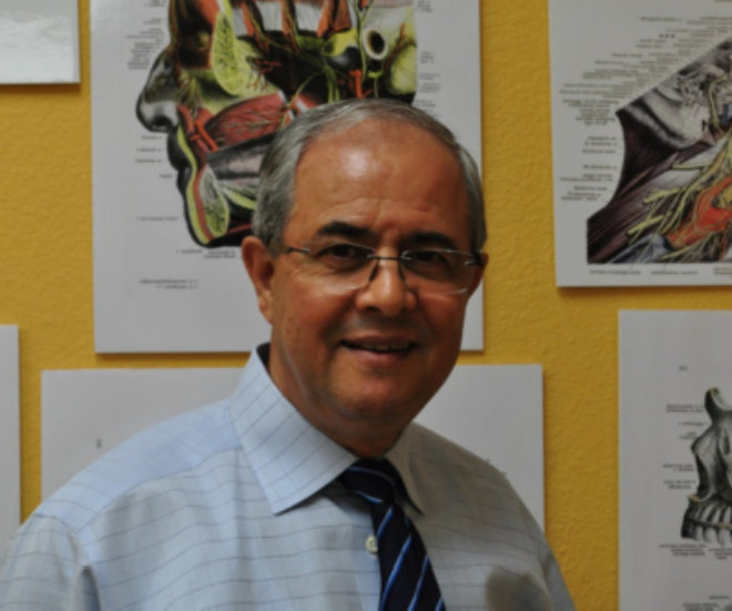 Faro T. Owiesy, MD in his clinic